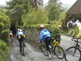 Riding along Wreyland Path through Lustleigh to get to the Primrose café